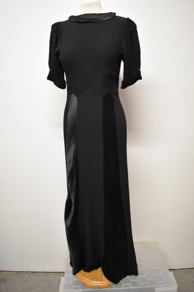 A stunning Art Deco 1930s evening gown of black satin backed crepe, with wonderful use being made of - Image 2 of 15