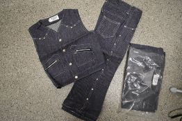 Two vintage 1970s childrens denim two piece outfits, new in packaging.