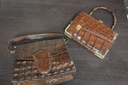 Two vintage Alligator handbags, with clasp fastenings, some wear in places.