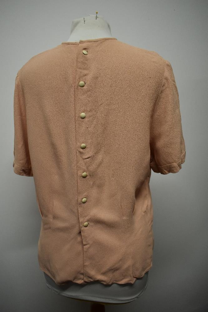 A 1940s blouse in a pale salmon shade, having buttons fastening to reverse and pin tucks to front. - Image 5 of 5