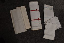 A selection of vintage unused sheets and pillow slips.