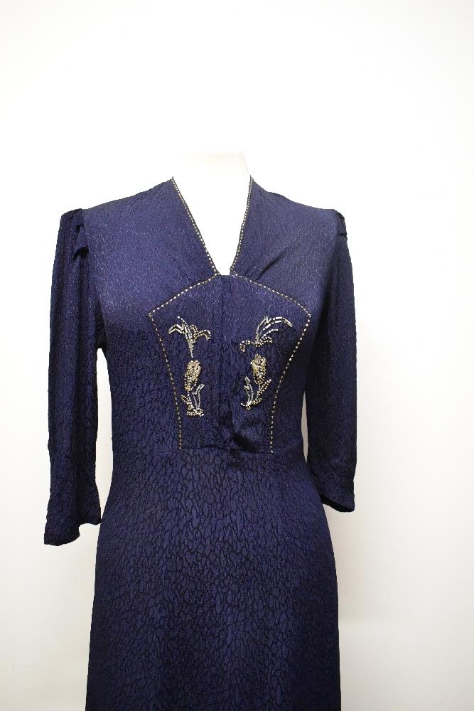 A 1940s navy blue textured crepe day dress, having 3/4 length sleeves, beadwork to bodice and - Image 2 of 6