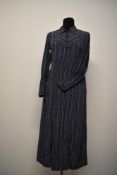 A 1930s navy blue day dress with white striped pattern, having lovely buttons to bodice and