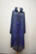 A magnificent royal blue 1920s coat or cover up, having extraordinary intricate gold and silver