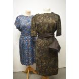 An early 1960s brown abstract patterned dress, having sash to waist, larger size, also included is a