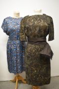 An early 1960s brown abstract patterned dress, having sash to waist, larger size, also included is a
