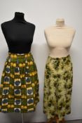 A 1940s floral skirt of lightweight semi sheer fabric and a 1950s bark cloth pleated skirt with
