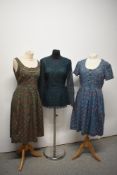 Two vintage dresses and a tunic, including blue floral medium weight cotton dress with pleated