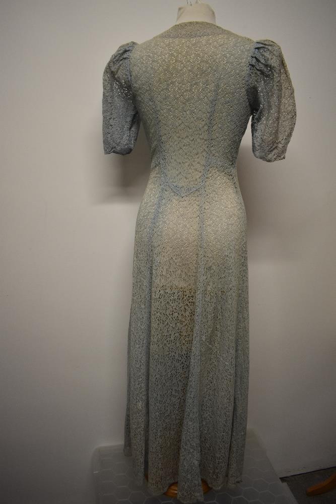 A Decadent 1930s blue semi sheer lace cover up/house coat, having centre hook and eye fastening - Image 6 of 11