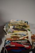 A mixed lot of of vintage and novelty tea towels, tea cosies, apron etc.
