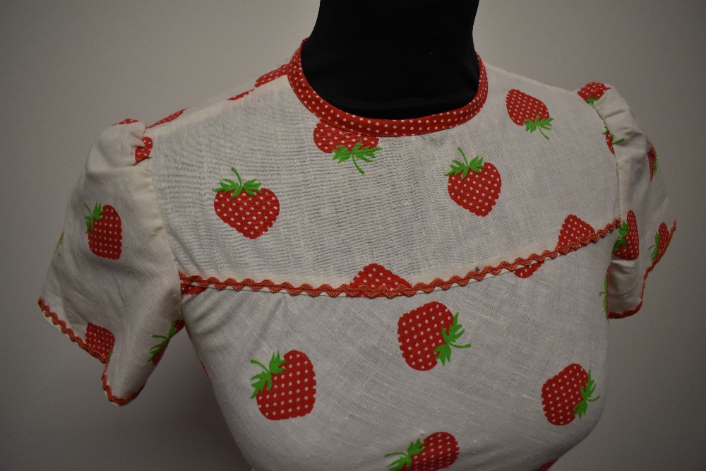 A 1950s/60s cotton dress, having strawberry print with red polka dot piping and Ric-Rac detail, back - Image 4 of 6