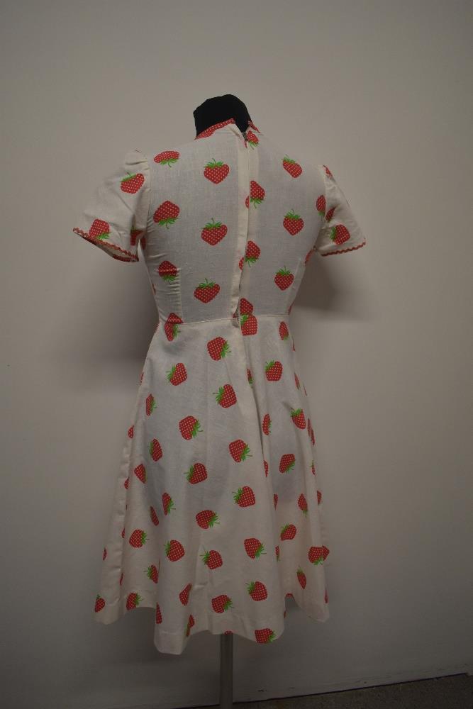 A 1950s/60s cotton dress, having strawberry print with red polka dot piping and Ric-Rac detail, back - Image 6 of 6