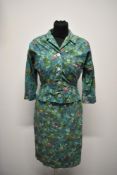 A 1950s novelty exotic bird print cotton two piece dress suit by Wetherall, having wiggle dress with