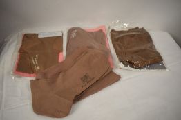 Four pairs of 1940s stockings, including three unworn CC41 utility marked pairs.