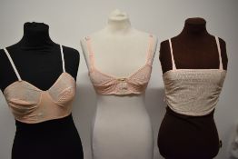 Two 1930s bralettes and a 1930s bra.