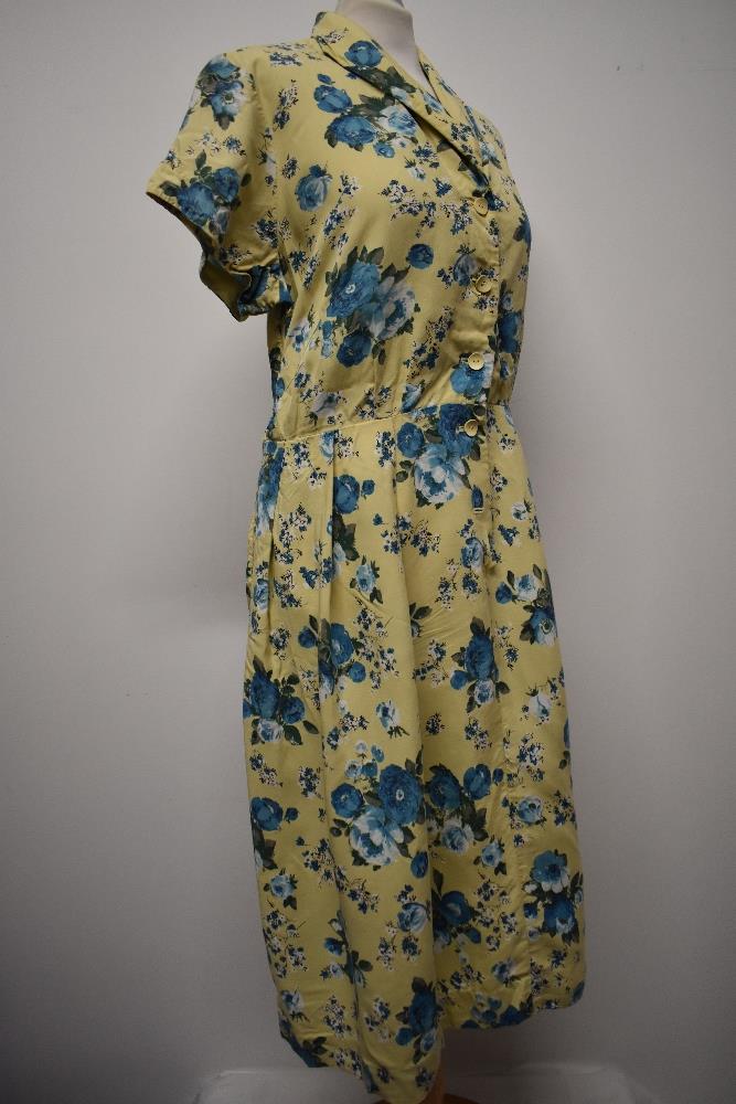 A 1940s St Michael floppy floral cotton day dress, having buttons to front and yellow ground with - Image 4 of 9