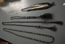 Two antique beaded necklaces, possibly jet and an Art Deco necklace and similar belt.