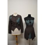 An unusual late 40/ 50s two piece set in grey crepe with teal cross design, comprising jacket with