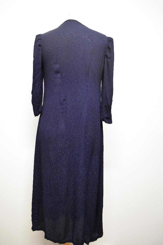 A 1940s navy blue textured crepe day dress, having 3/4 length sleeves, beadwork to bodice and - Image 6 of 6