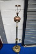 A Victorian brass standard lamp, converted from oil to electric