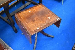 A reproduction Regency style drop flap coffee table of small proportions