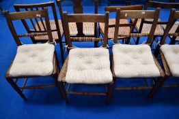 A set of six 19th Century rush seated railback dining chairs