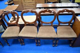 Four Victorian mahogany balloon back dining chairs , slightly different design with upholstered