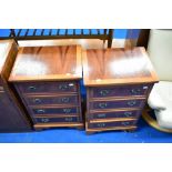 A pair of reproduction Regency four drawer bedside chests