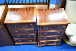 A pair of reproduction Regency four drawer bedside chests