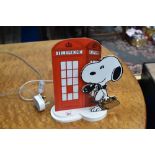 A novelty snoopy themed table lamp