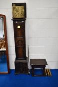 An early 20th Century oak case long case clock of small proportions having Jacobean style case,