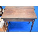 A 19th Century fold over tea table having inlaid square tapered legs