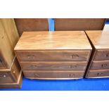 An Ercol bedroom chest of three long drawers