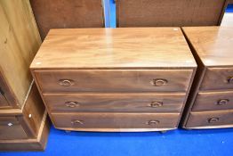 An Ercol bedroom chest of three long drawers