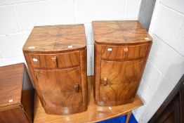 A pair of Art Deco walnut pot cupboards/bedside cabinets