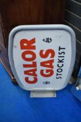 A metal calor gas retail sign in frame and mount