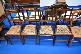 A selection of seven cane seated bedroom chairs