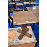 A vintage oak occasional low table having bulbous column