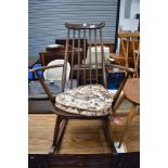 A traditional Ercol rocking armchair (dark stain)