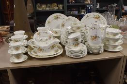A large lot of Coalport 'Wenlock fruit; table ware, inclduing cups, saucers, soup bowls and
