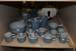 A variety of Midwinter stoneware table ware, including mugs, bowls, jugs, sugar basins and more,