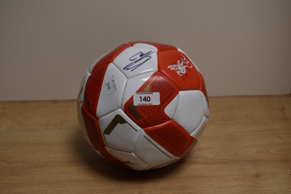 A Liverpool Football club signed football.