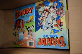 Two boxes of vintage The Beano book and the Dandy book.