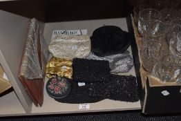A box full of vintage drinking glasses, including rummers and wine glasses.