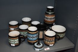 An assortment of Ambleside pottery, to include trinket dish, vases, mugs, jug and bowl.