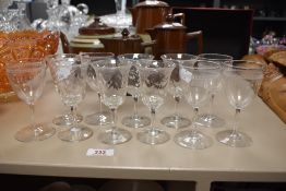 A collection of Antique wine glasses, including etched examples.