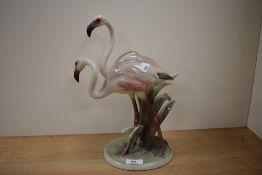 A mid century Austrian study of two flamingos.