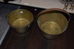 Two vintage brass jam pans.