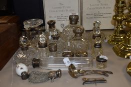 A collection of antique and vintage perfume bottles, dressing table items, purse and similar, many