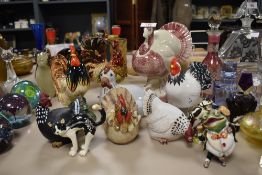 A collection of modern cockerel studies, and an enamelled frog study and similar cat and bird